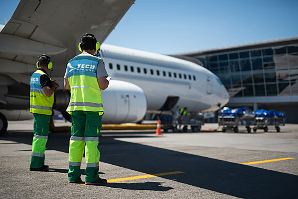 Tech Freight Employees on the Tarmac